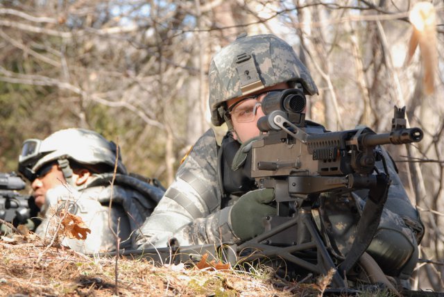 Soldier with the M240L Lightweight Medium Machine Gun