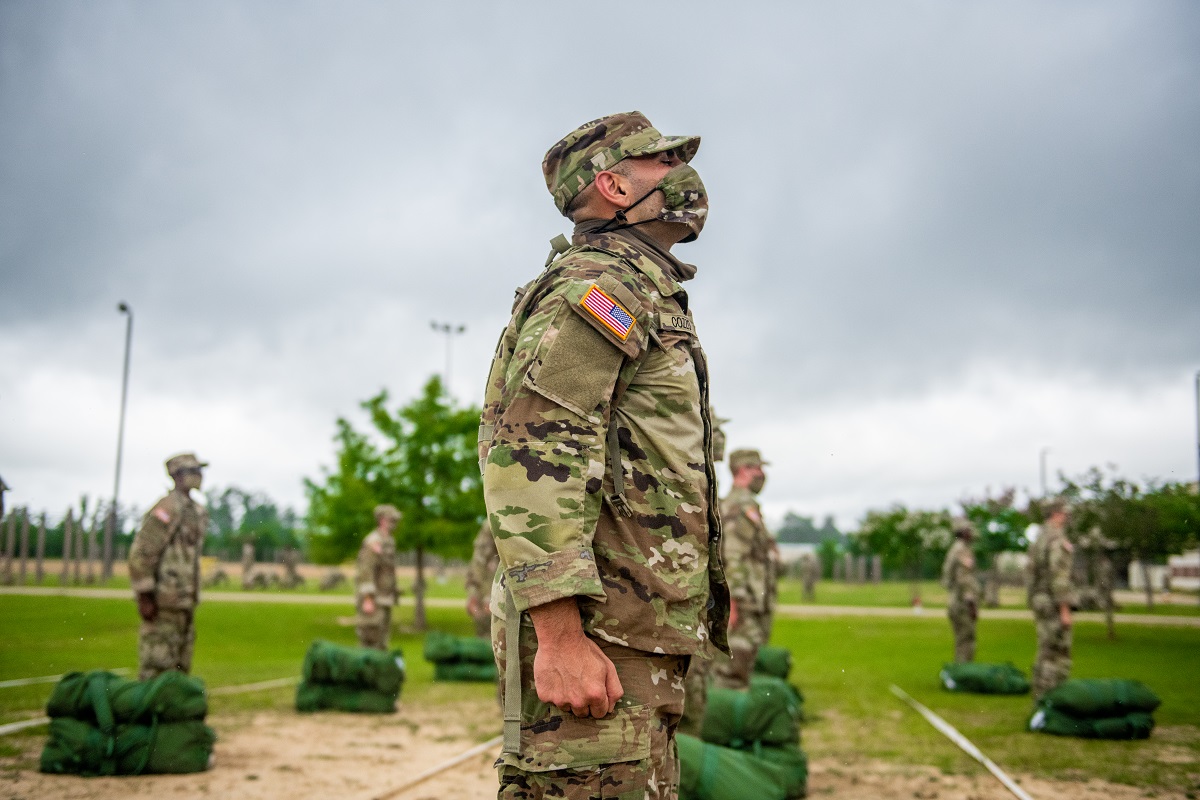 Cozzo and other trainees pay close attention to instructions from drill sergeants on the first official day of Armor One Station Unit Training  