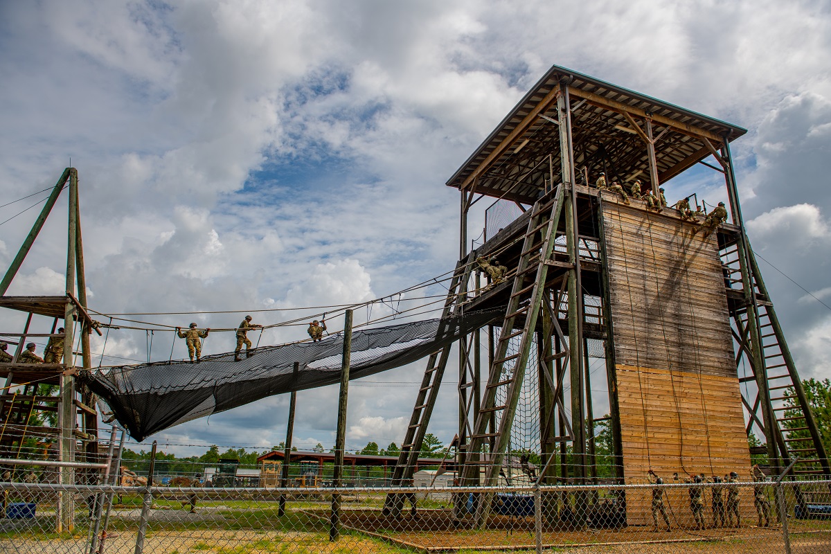 The trainees negotiate the Confidence Tower on Harmony Church during Week 6 of training. Rappelling the tower correctly is a graduation requirement for trainees. 