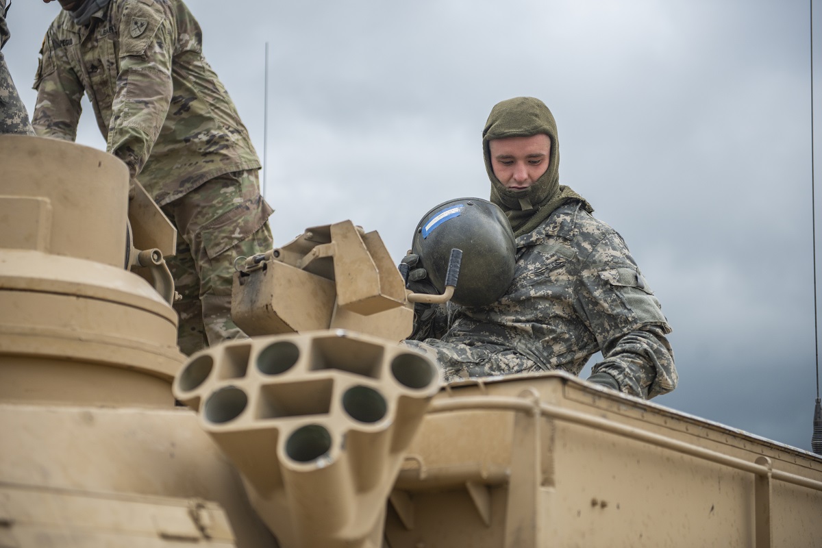  Braaten prepares to fire the M1 Abrams tank for the first time. 