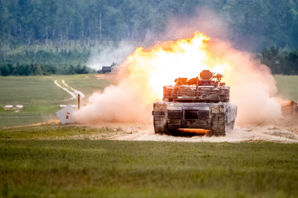 Braaten and the trainees of Bravo Company, 1<sup>st</sup> Battalion, 81<sup>st</sup> Armor Regiment, fire the main gun on the U. S. Army’s M1 Abrams main battle tank.  The M1 Abrams utilizes a 120 mm smoothbore gun that fires a variety of rounds capable of destroying enemy armor from great distances. 