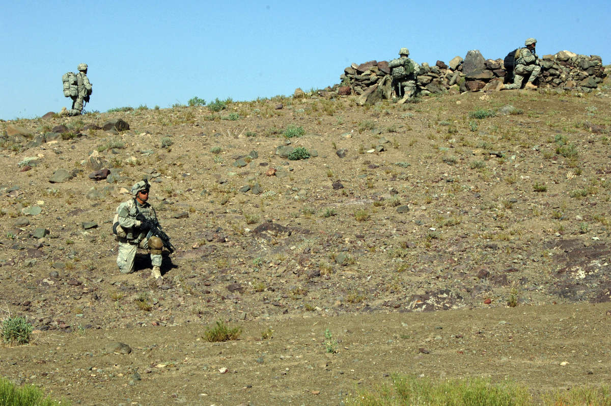 Soldiers make a security halt.