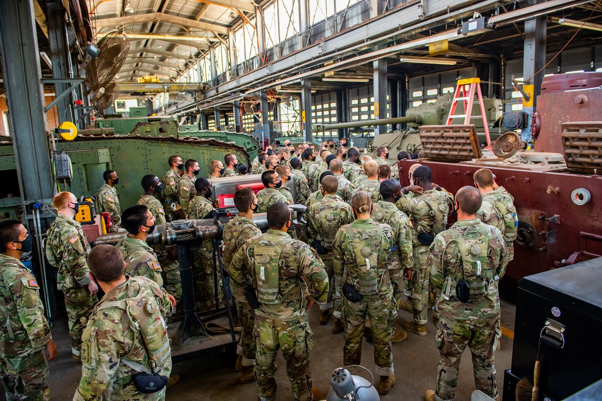 a lesson in armor history at the Armor Museum Restoration Shop